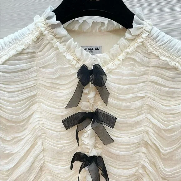 CHANEL Cream Ruffled Long-Sleeve Blouse with Black Bow Accents - Picture 3 of 7